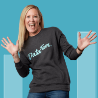 Lindsay Betzendahl smiling wearing a DataFam shirt with hands in celebration and a teal background with bar chart