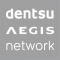「Dentsu Aegis 」的標誌